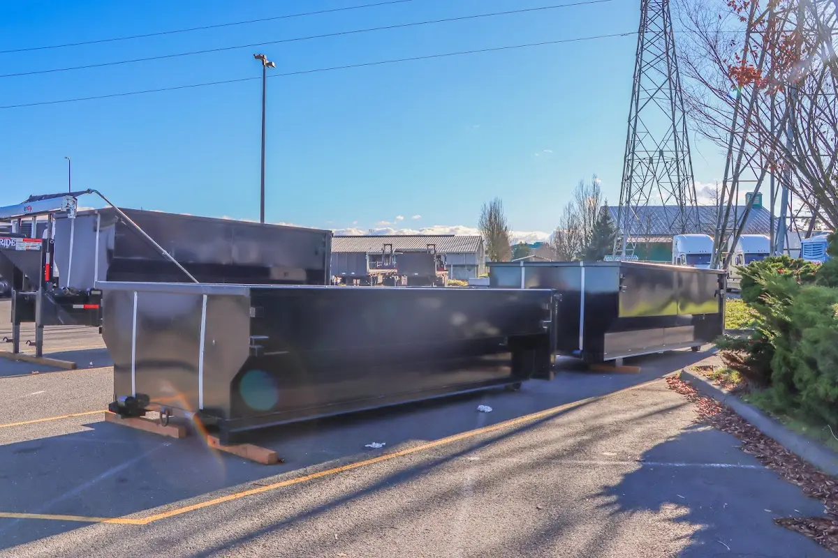 Roll-off dumpster ready for waste disposal at job site for 15 Yard Dumpster Rental in Wildwood
